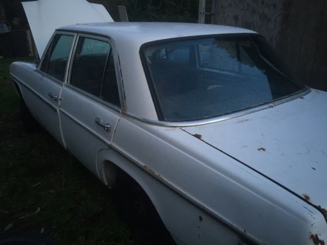 1970 White Mercedes-Benz 200-Series Sedan