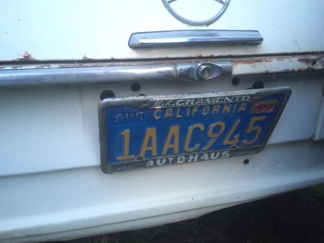 1970 White Mercedes-Benz 200-Series Sedan