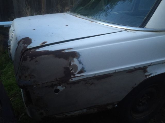 1970 White Mercedes-Benz 200-Series Sedan