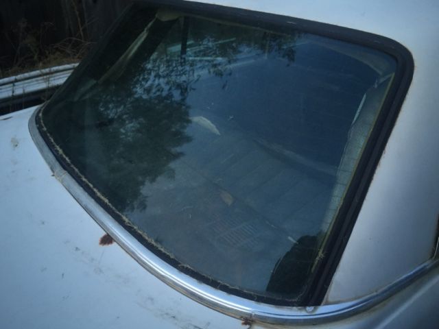 1970 White Mercedes-Benz 200-Series Sedan