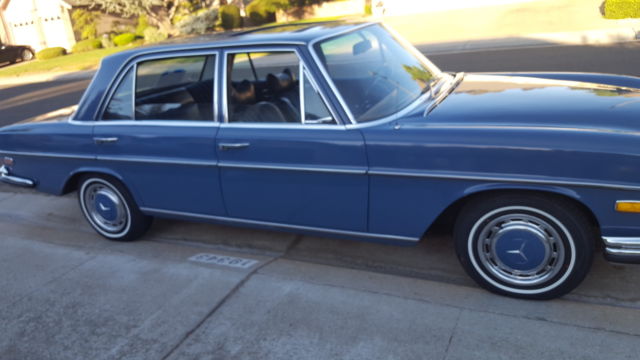 1971 White Mercedes-Benz 200-Series Sedan