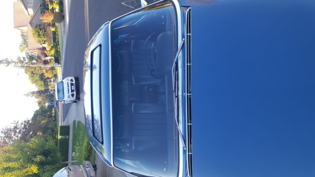 1971 White Mercedes-Benz 200-Series Sedan