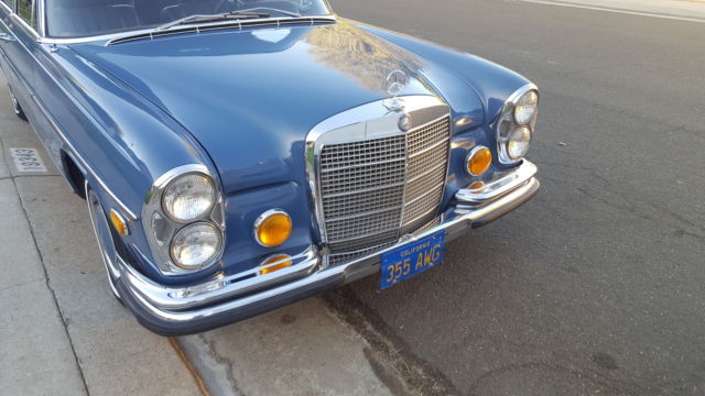 1971 White Mercedes-Benz 200-Series Sedan