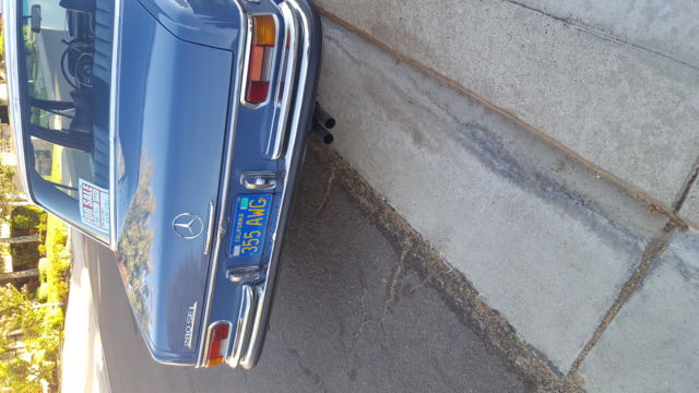 1971 White Mercedes-Benz 200-Series Sedan