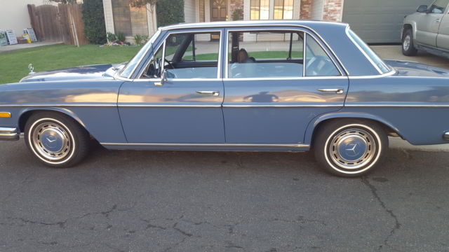 1971 White Mercedes-Benz 200-Series Sedan