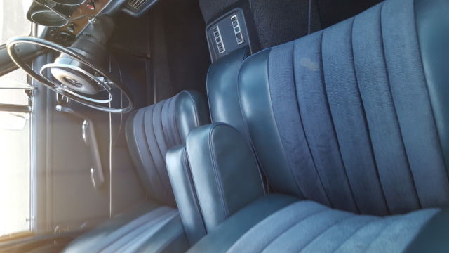 1971 White Mercedes-Benz 200-Series Sedan