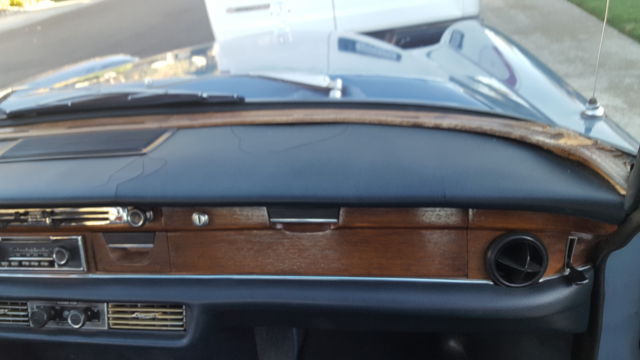 1971 White Mercedes-Benz 200-Series Sedan