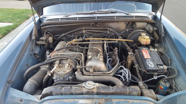 1971 White Mercedes-Benz 200-Series Sedan