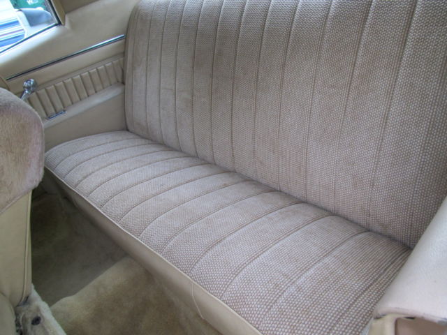 1970 gold and cream Chevrolet Monte Carlo Coupe