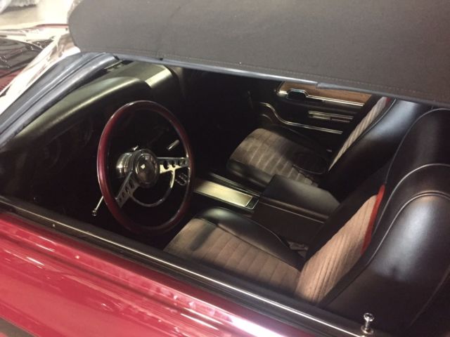 1970 burgundy Ford Mustang Convertible