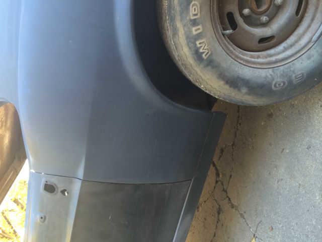 1970 primer Ford Mustang fastback