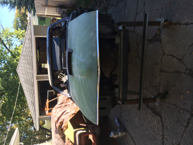 1970 primer Ford Mustang fastback