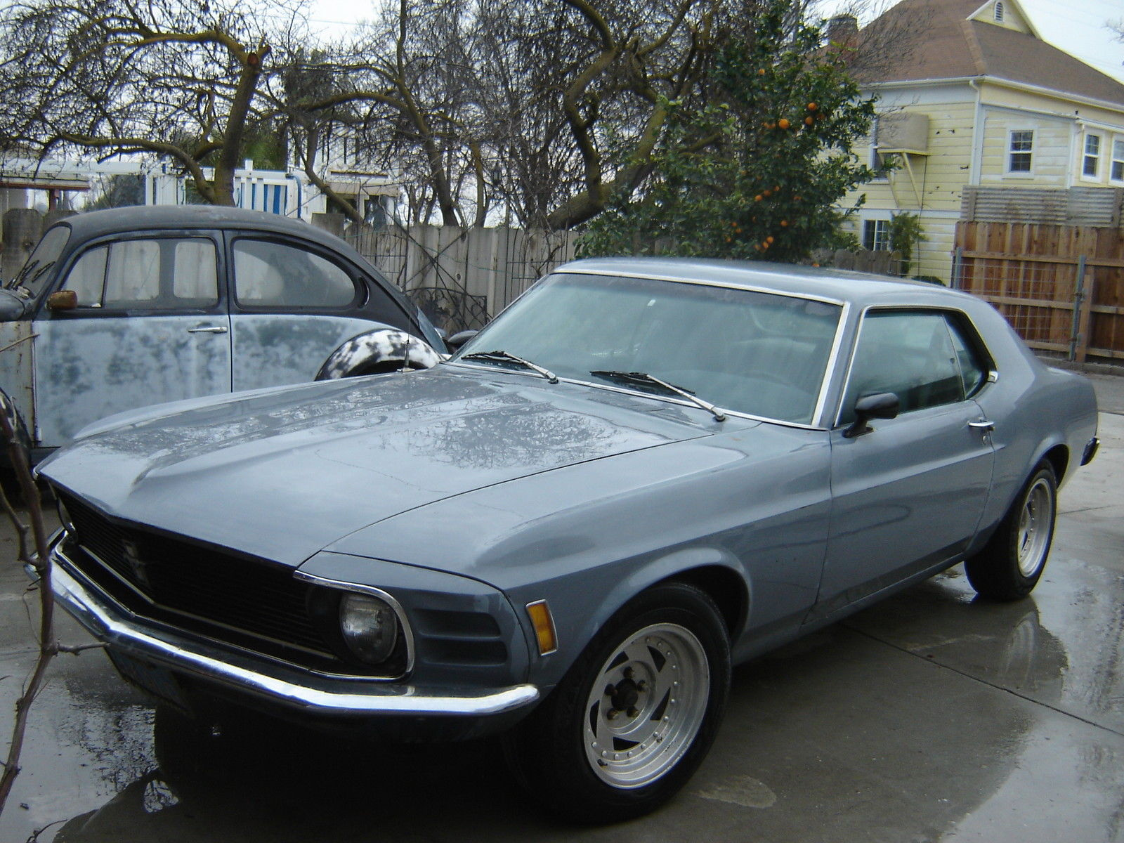 1970 primer gray Ford Mustang