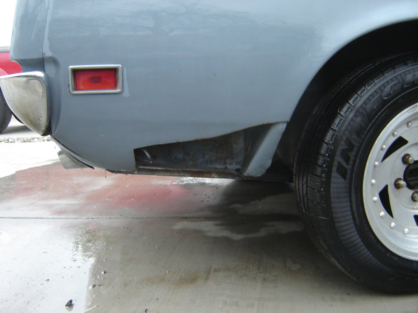 1970 primer gray Ford Mustang