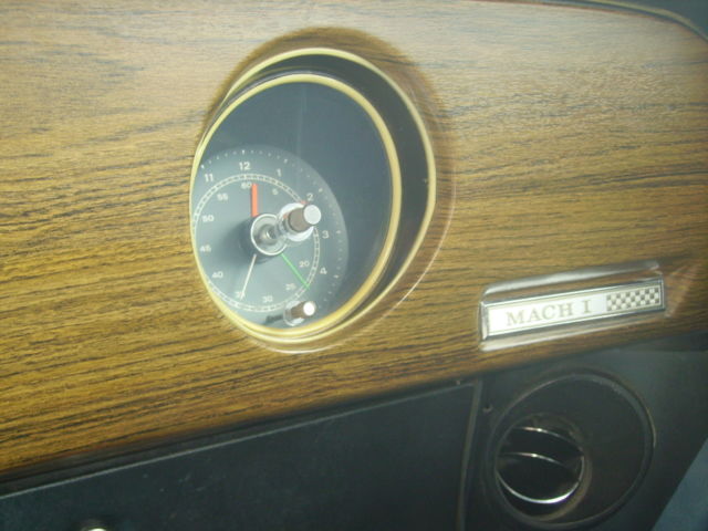 1970 white Ford Mustang sportroof