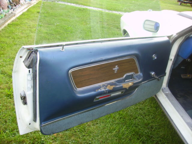 1970 white Ford Mustang sportroof