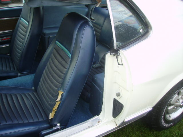 1970 white Ford Mustang sportroof