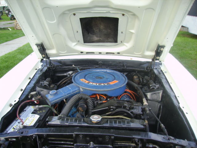 1970 white Ford Mustang sportroof