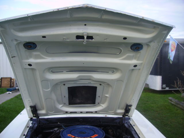 1970 white Ford Mustang sportroof