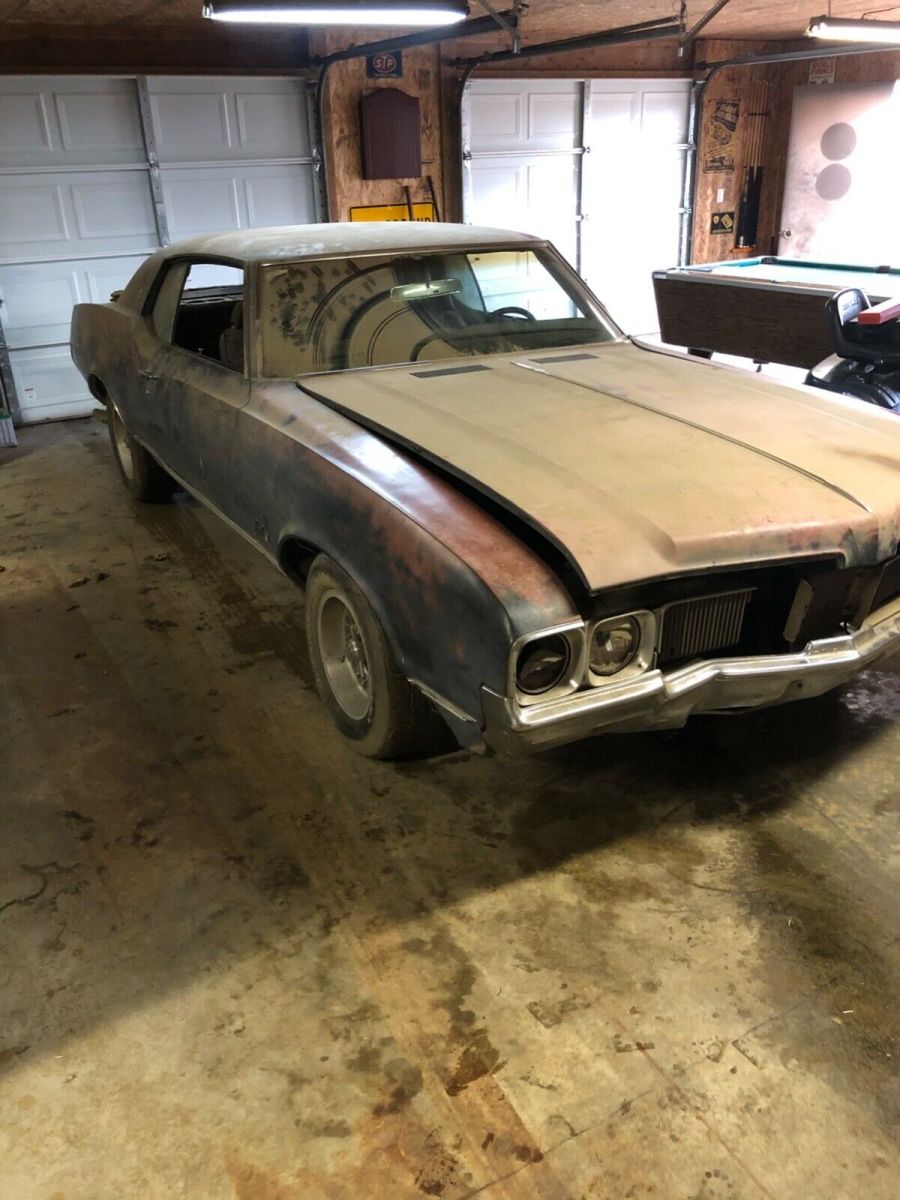 1970 Green Oldsmobile Cutlass Coupe