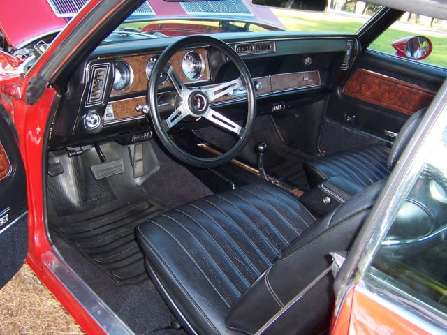 1970 Red Oldsmobile Cutlass Coupe