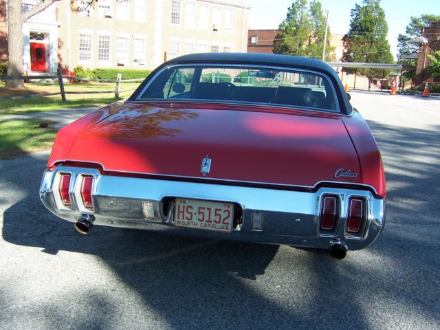 1970 Red Oldsmobile Cutlass Coupe