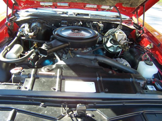 1970 Red Oldsmobile Cutlass Coupe