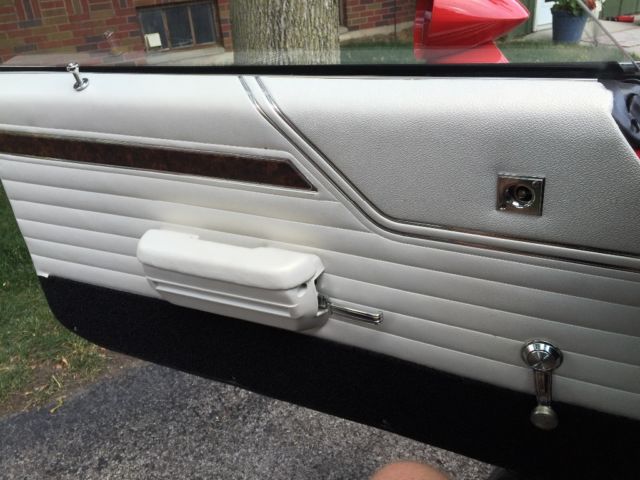 1970 Red Oldsmobile Cutlass Coupe