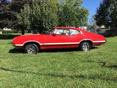 1970 Red Oldsmobile Cutlass Coupe