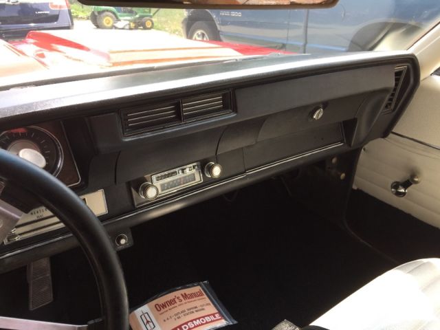 1970 Red Oldsmobile Cutlass Coupe