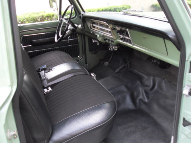 1970 Two Green and Cream Ford F-100 Pickup