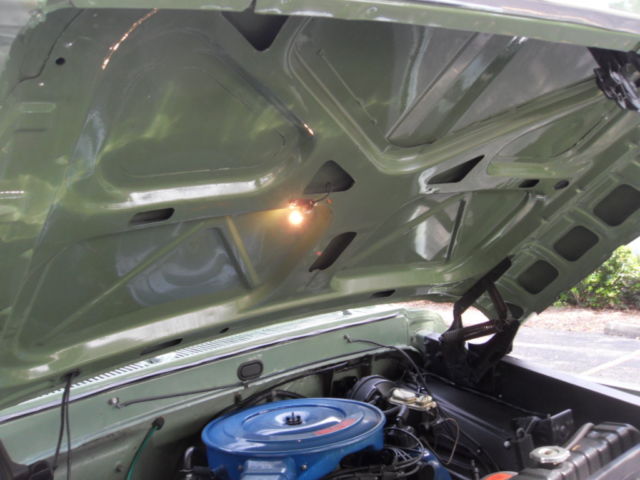 1970 Two Green and Cream Ford F-100 Pickup