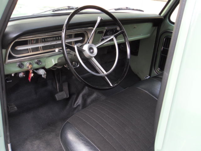 1970 Two Green and Cream Ford F-100 Pickup