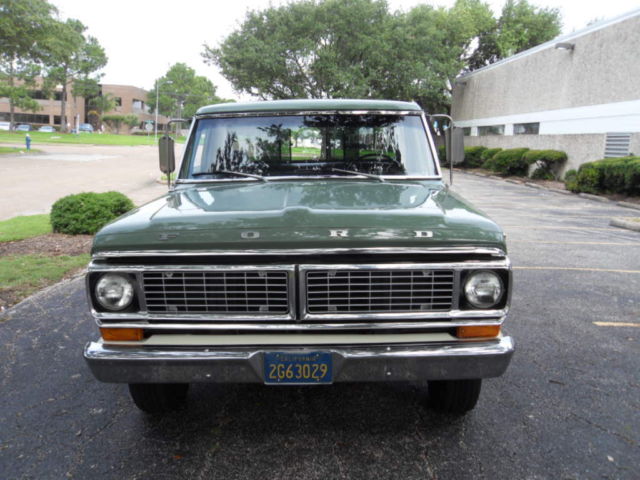 1970 Two Green and Cream Ford F-100 Pickup