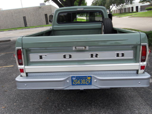 1970 Two Green and Cream Ford F-100 Pickup