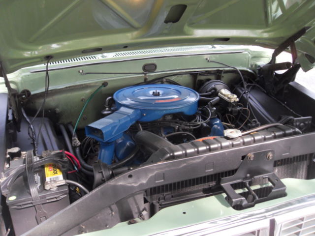 1970 Two Green and Cream Ford F-100 Pickup