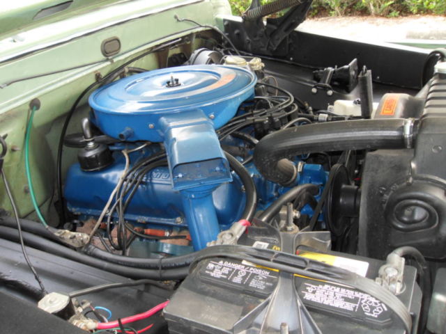 1970 Two Green and Cream Ford F-100 Pickup