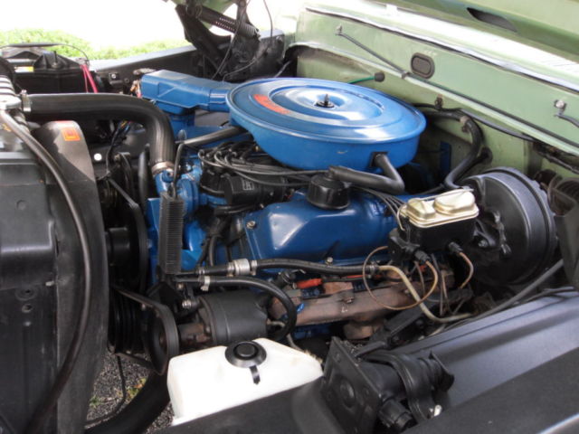 1970 Two Green and Cream Ford F-100 Pickup