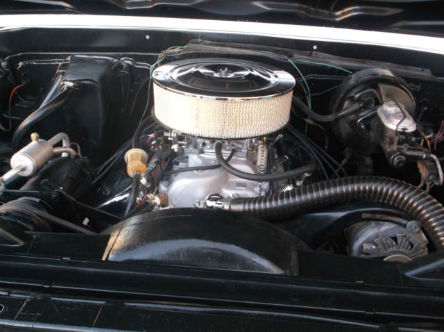 1970 teal/white Chevrolet Suburban