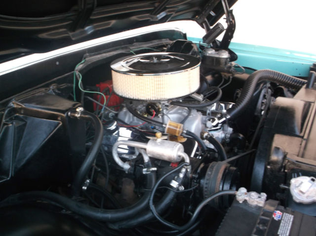 1970 teal/white Chevrolet Suburban