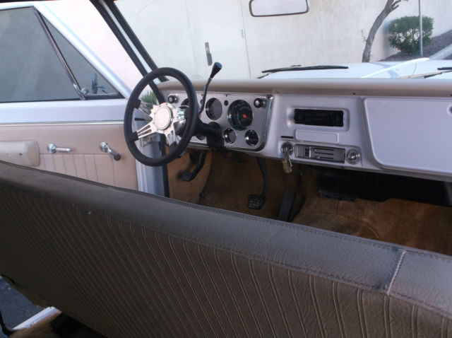 1970 teal/white Chevrolet Suburban