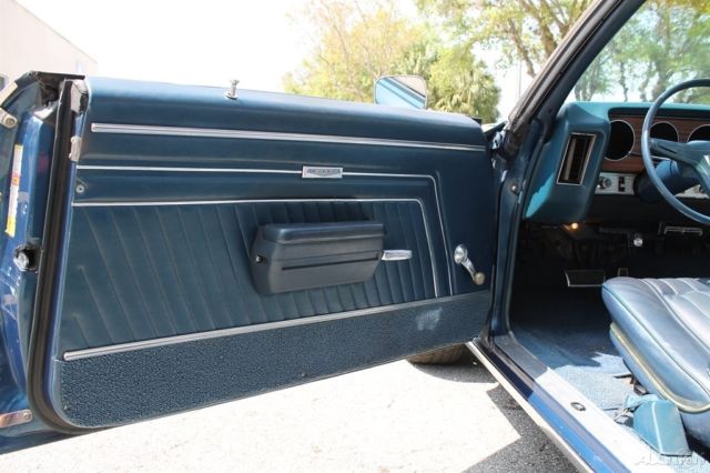 1970 Red Cadillac DeVille Convertible