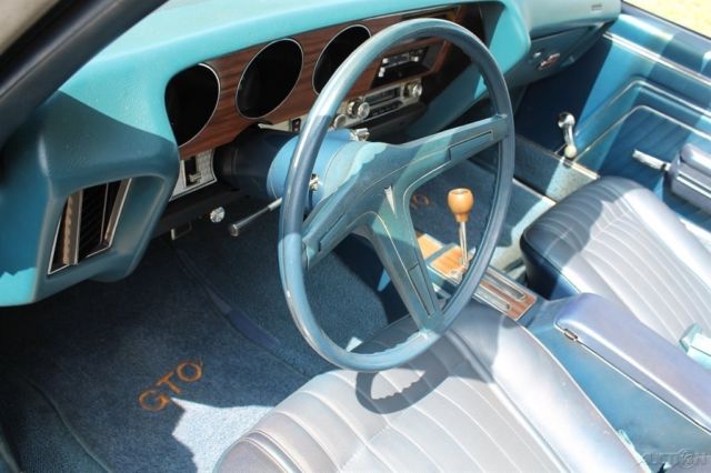 1970 Red Cadillac DeVille Convertible