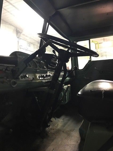 1971 Green Ford 4WD cabover fire truck