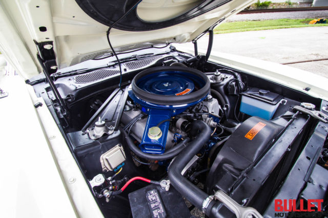 1971 white Ford Mustang coupe
