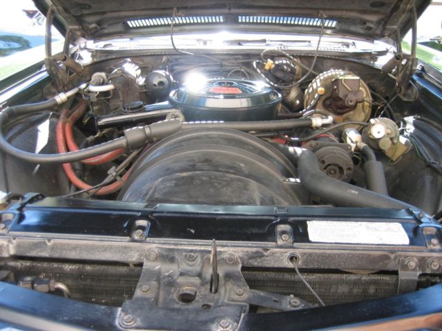 1971 metallic green Chevrolet Monte Carlo