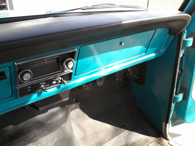 1971 Grabber blue/white cab roof Ford F-100 pickup truck