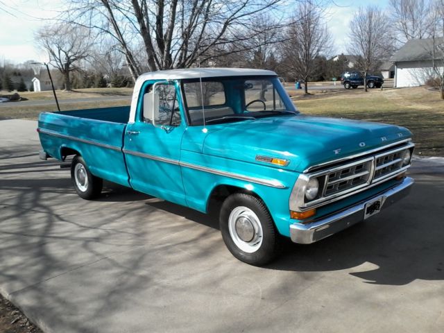 1971 Grabber blue/white cab roof Ford F-100 pickup truck