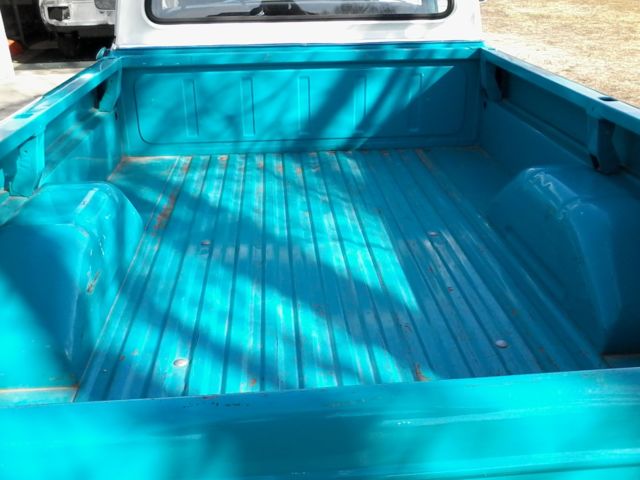 1971 Grabber blue/white cab roof Ford F-100 pickup truck