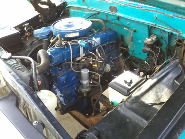 1971 Grabber blue/white cab roof Ford F-100 pickup truck